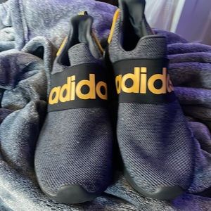 Slip on black and yellow shoes